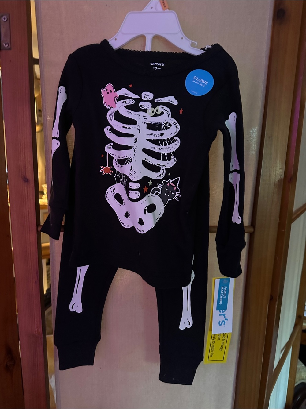 NWT 12 months Carter's Black Skeleton Glow Pajama Set with lace detailing at mec